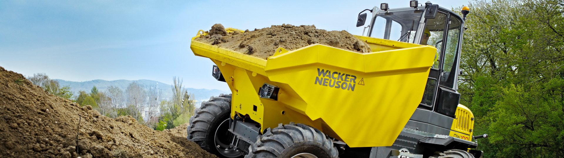 Wacker Neuson compact dump truck with reliable drive systems and customizable configurations for efficient material transport in construction and landscaping.