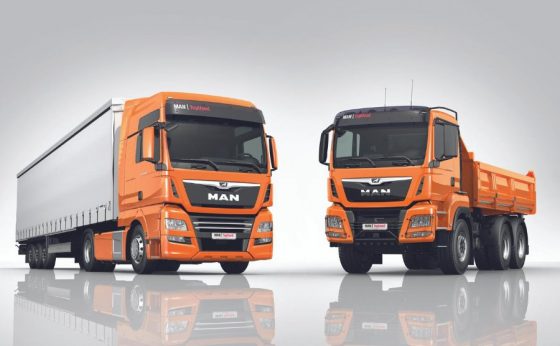 New man trucks in two new styles: one is fully packed with cargo, while the other is semi-packed, showing some space