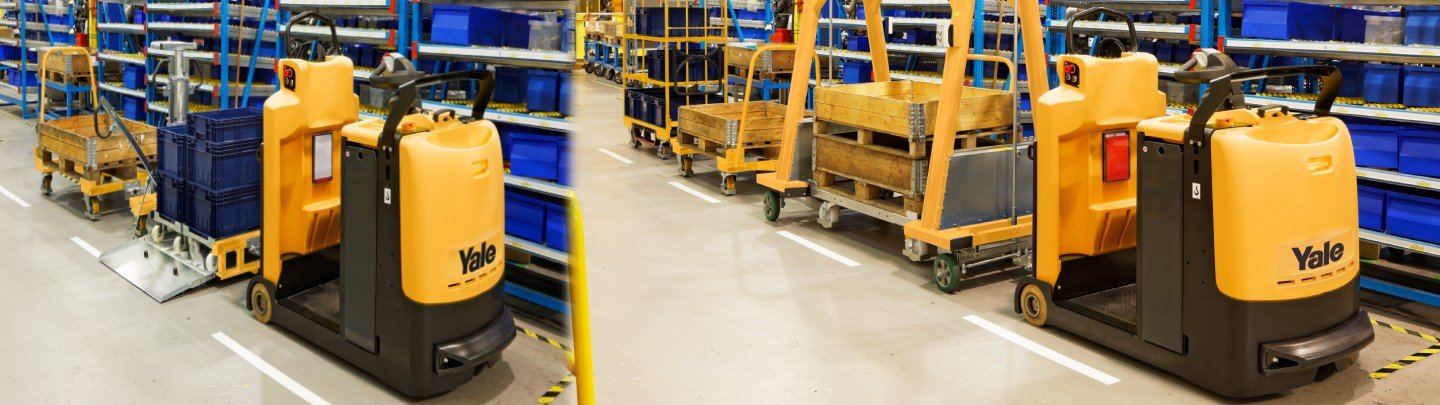 Yale tow tractors offering enhanced performance, maneuverability, and comfort for efficient horizontal transport and line-feed operations in UAE warehouses.