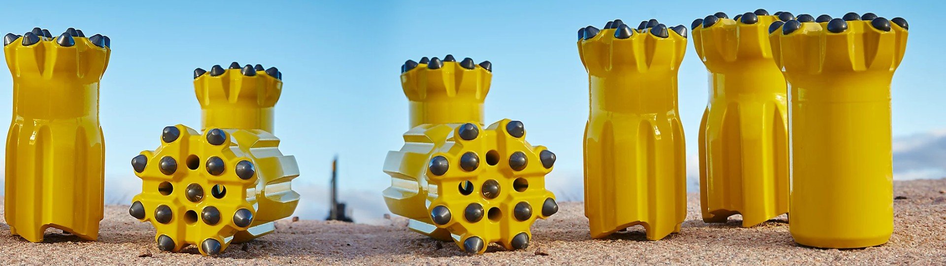 High-quality top hammer drilling tools designed for efficient percussive drilling in hard rock, used in mining, construction, and quarrying.