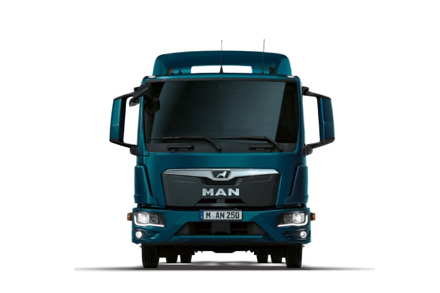 MAN TGL medium-duty truck on road, designed for urban and regional distribution with compact size, efficient engine, and maneuverability in city environments