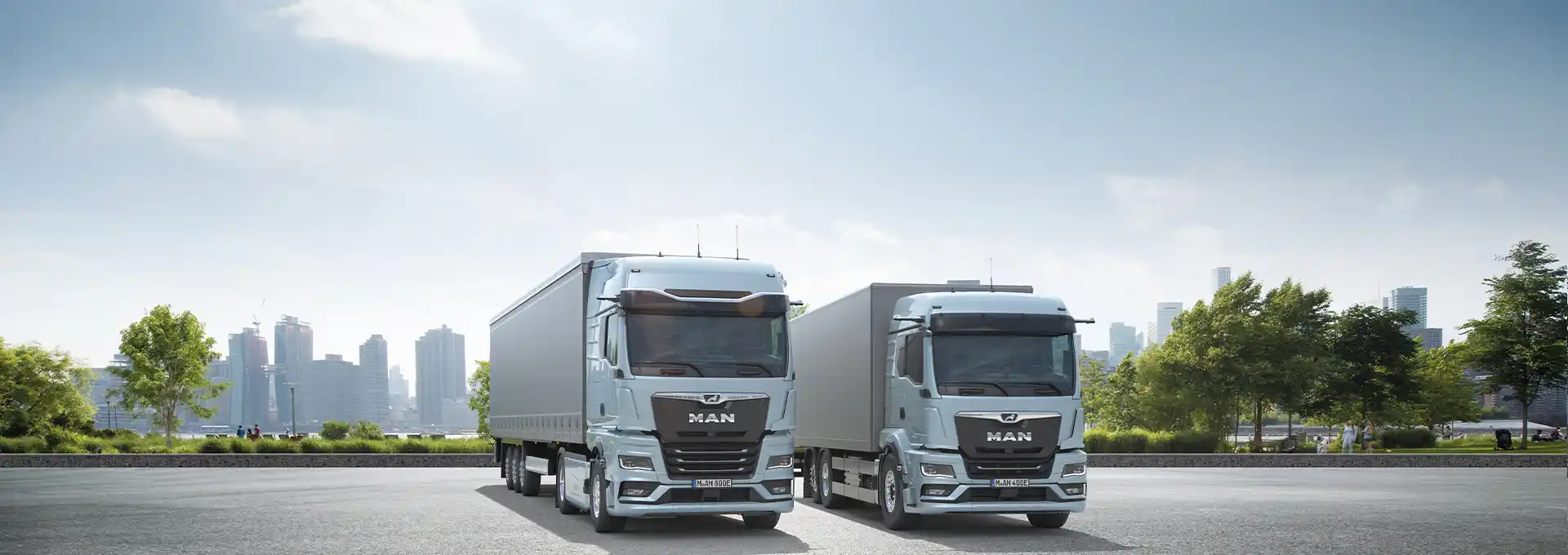Two latest generation MAN TGX tractor head trucks for long-haul and heavy transport logistics in the UAE. Reliable commercial vehicles from UMHE.